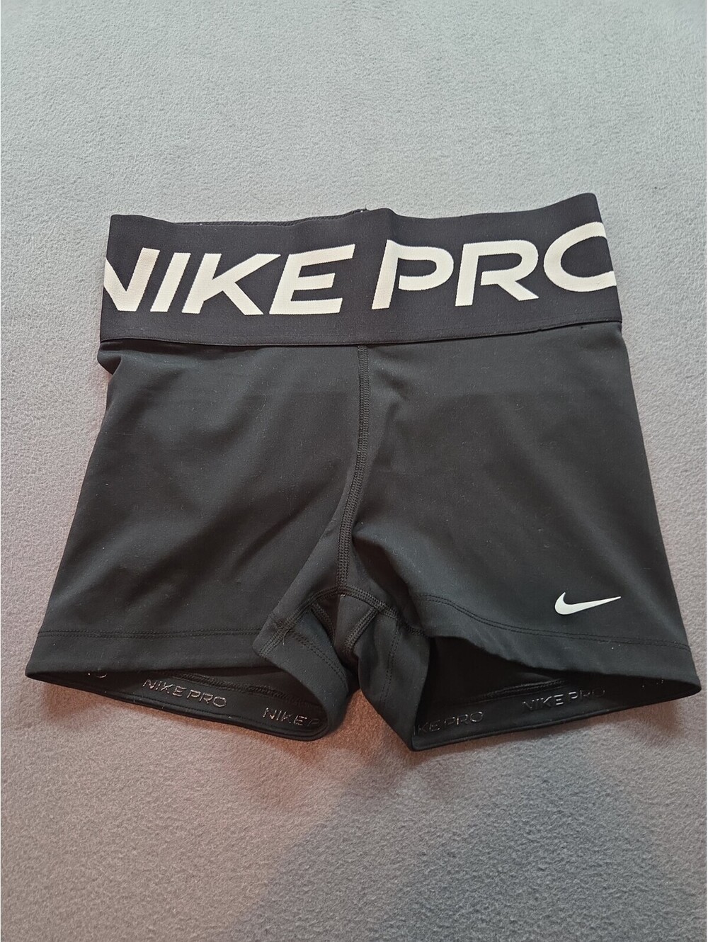 women's black athletic shorts by Nike Pro size L